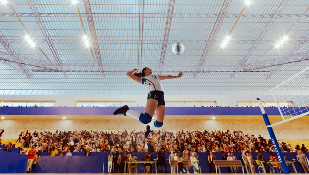 Schülerin beim Volleyballturnier in einer modernen Sporthalle – private Gymnasien in Berlin bieten vielseitige Sportmöglichkeiten.