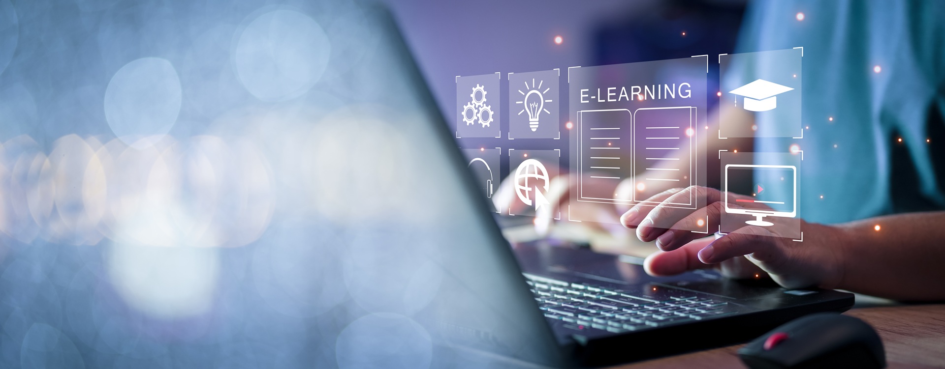 Laptop mit Symbolen für digitales Lernen | E-Learning Anbieter